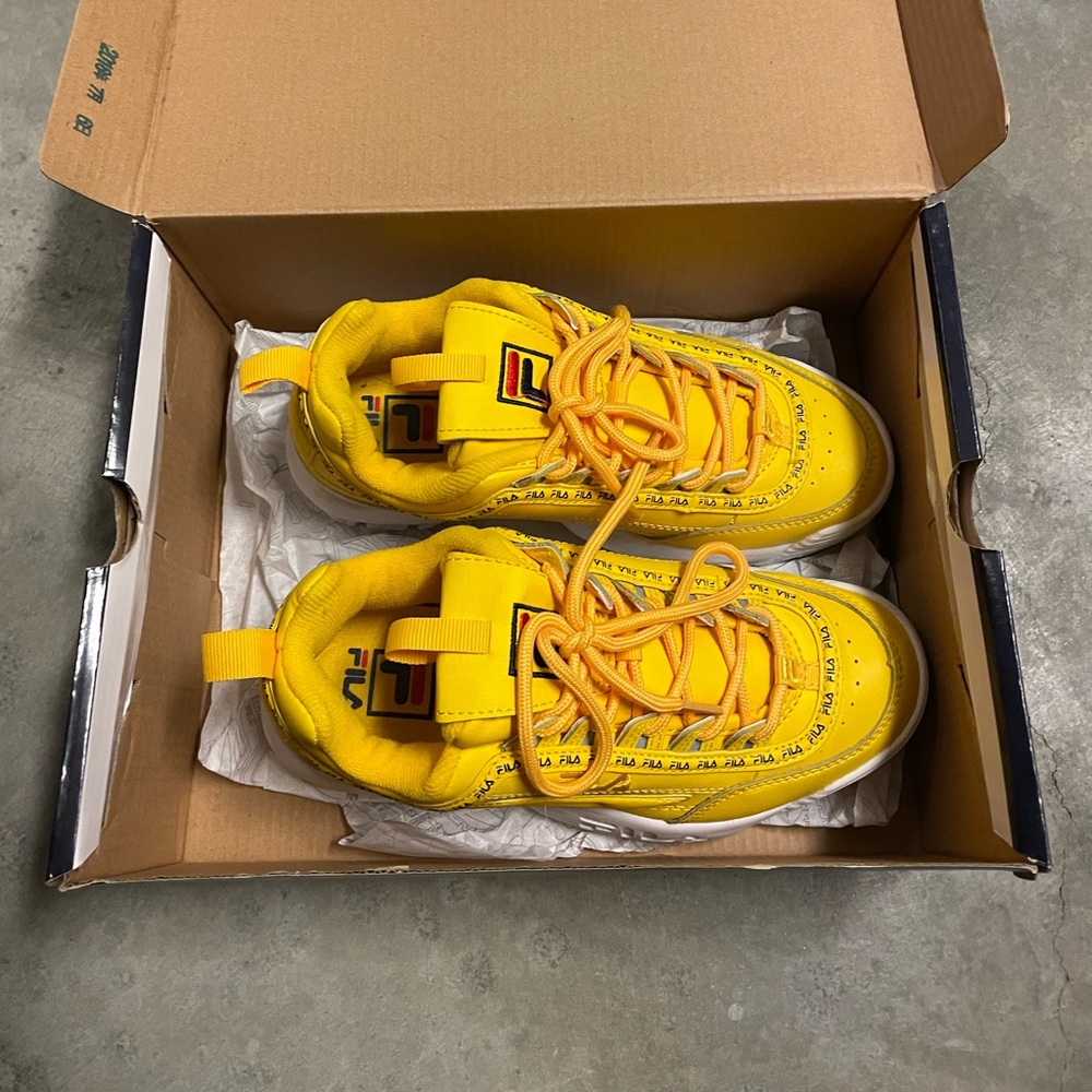 Yellow Fila Disruptor II’s
